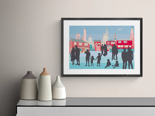 Bespoke art print with illustrations of different family members, houses and landmarks, hanging above a table.