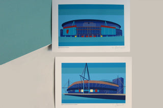 Two commissioned blue illustrated prints of Emirates and Cardiff sports stadiums.