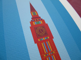 Angled view of a red and blue illustrated print of Big Ben, showing the texture of the paper.