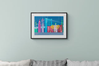 Close up of illustrated New York Skyline print by South Island Art, on dusky green wall.