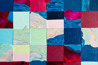 Detail of multicolour squares in a patchwork formation on original painting. The squares are a mix of flat and fluid paint.
